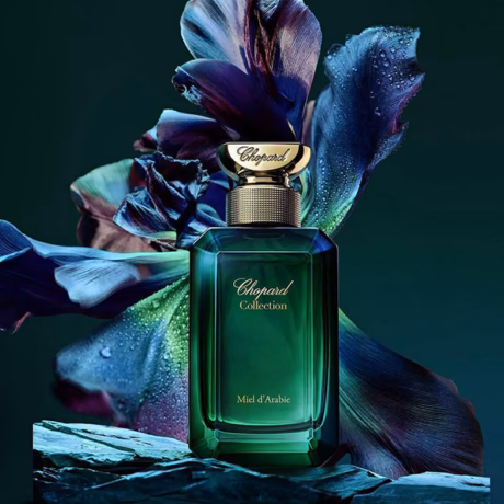 Елегантен аромат Chopard Miel d’Arabie върху тъмен ориенталски фон